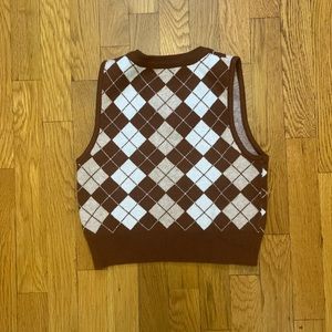 Brown small sweater vest.
